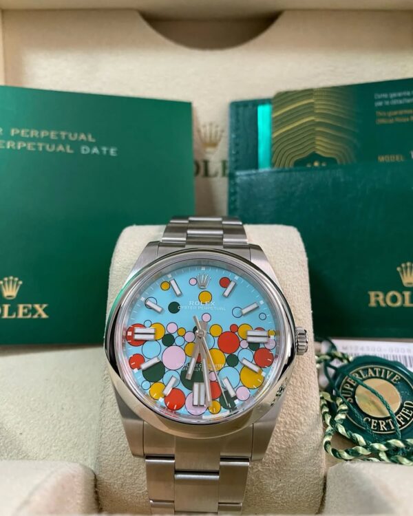 Rolex Oyster Perpetual 41 - 2023 - Domed Bezel - Turquoise Blue Celebration-Motif Dial - Oyster Bracelet - 124300 *FULL SET*
